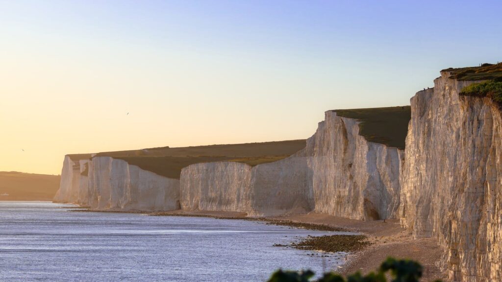 Breathtaking sunset over the iconic Seven Sisters cliffs in England, capturing natural beauty.